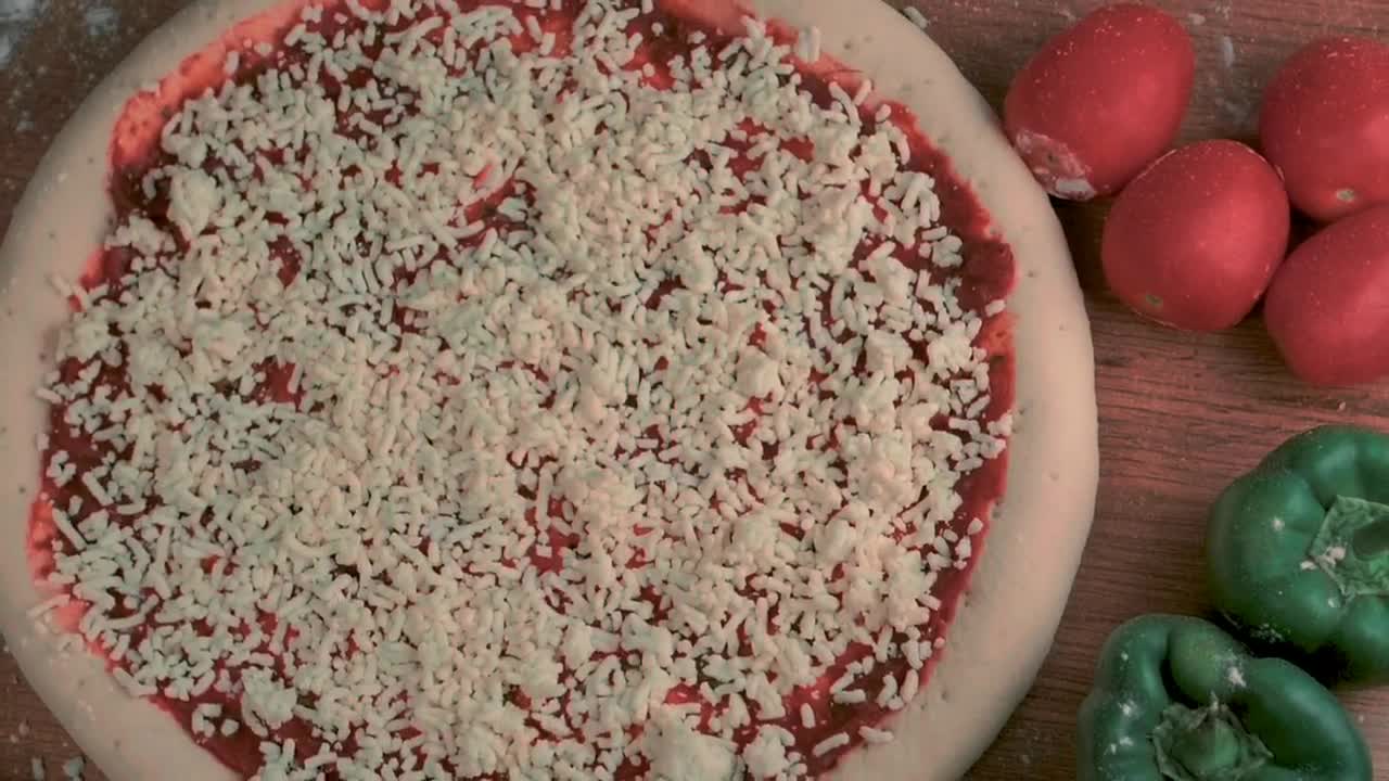 Download Video Stock Preparing A Pepperoni Pizza Top View Live Wallpaper Free