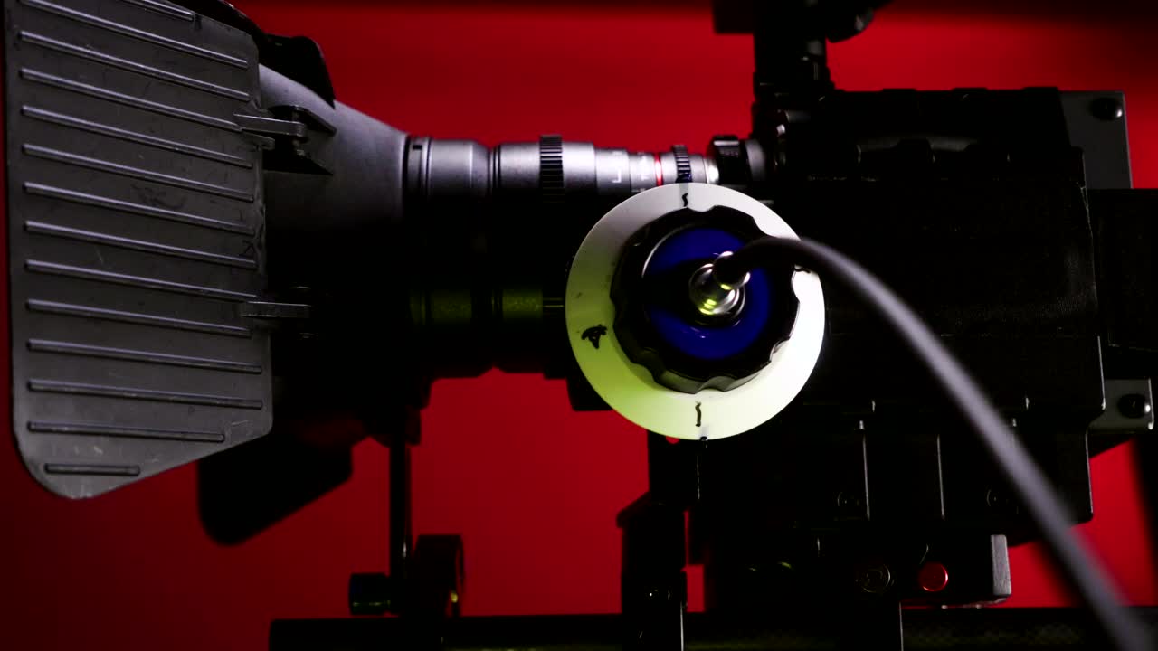 Download Video Stock Red Camera Against A Red Background Live Wallpaper Free