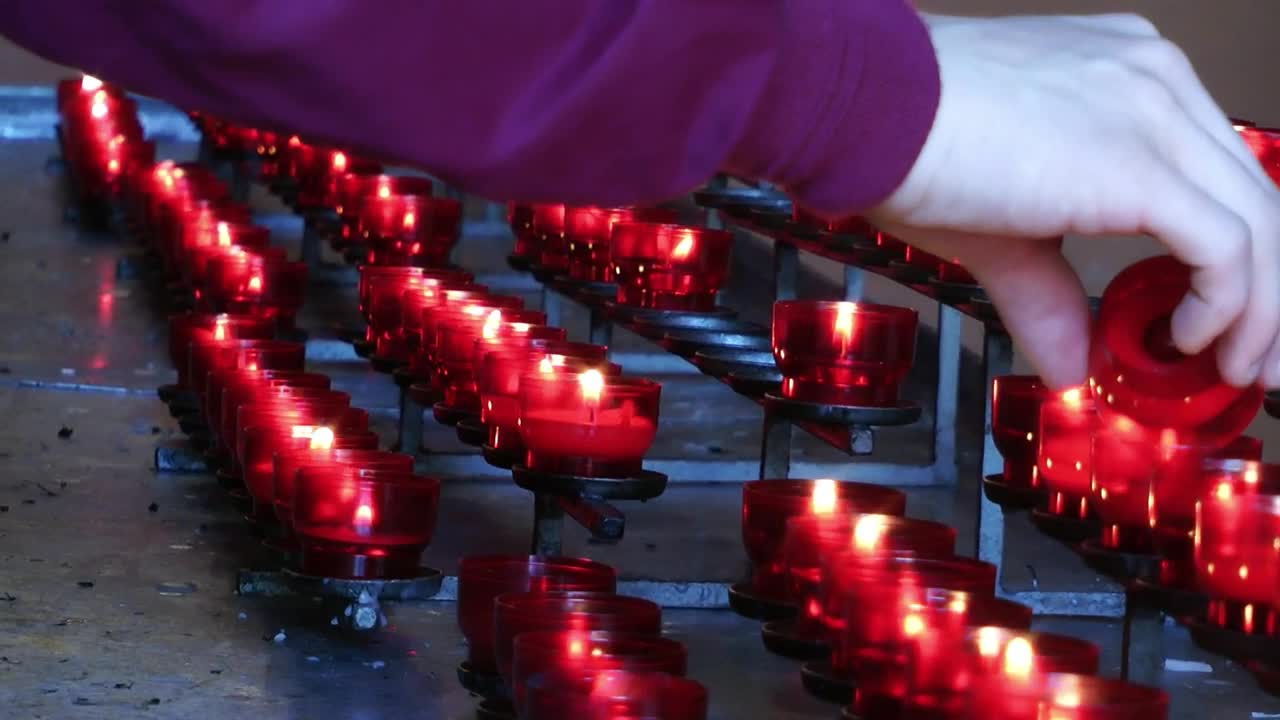 Download Video Stock Red Candles In Church Live Wallpaper Free