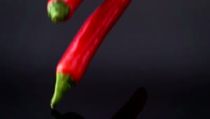 Video Stock Red Chili Pepper Falling Into Black Water Live Wallpaper Free
