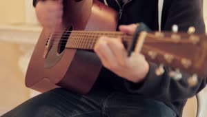 Free Stock Video Sitting Down And Playing A Guitar Live Wallpaper