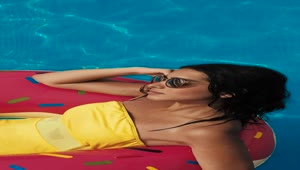 Free Stock Video Sitting In An Inflatable Donut In A Pool Live Wallpaper