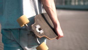 Free Stock Video Skateboarder Walking With His Skateboard Live Wallpaper