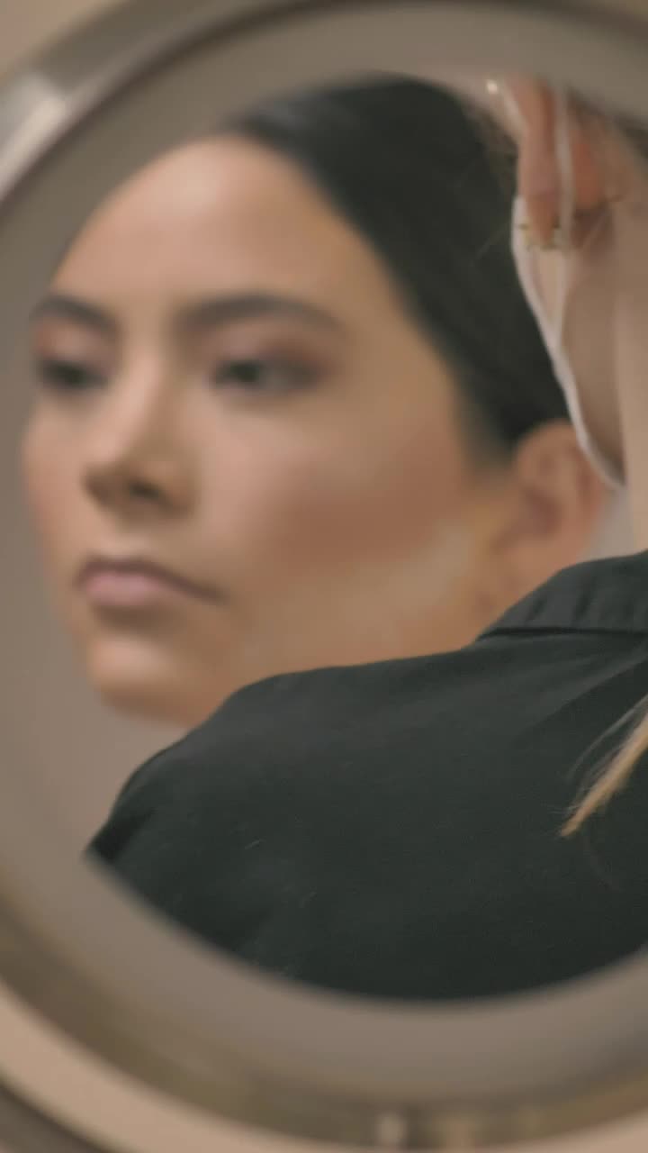 Download Free Stock Video Reflection Of A Girls Face While Being Made Up Live Wallpaper