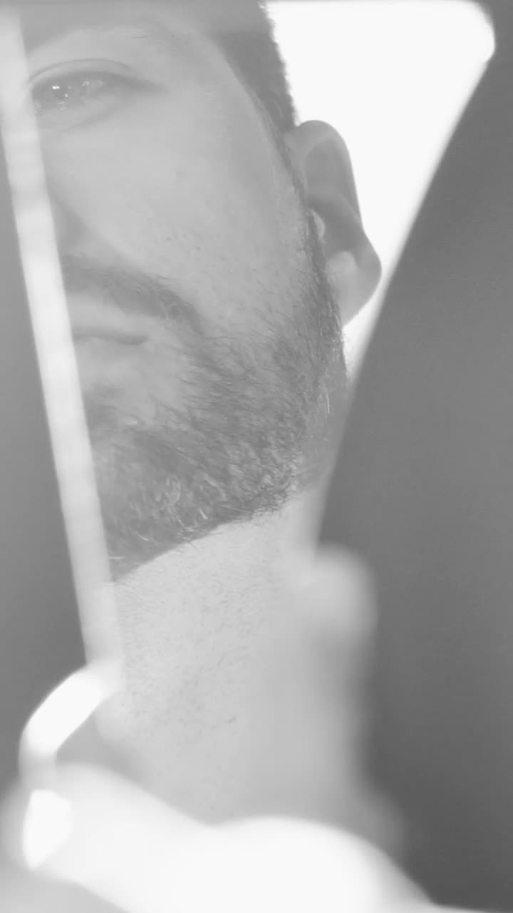 Download Free Stock Video Reflection Of A Man In A Piece Of Broken Mirror Live Wallpaper