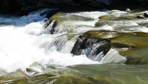 Free Stock Video River Flowing Over Large Rocks Live Wallpaper
