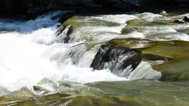 Download Free Stock Video River Flowing Over Large Rocks Live Wallpaper