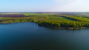 Free Stock Video River Near A Growing Area Aerial Shot Live Wallpaper