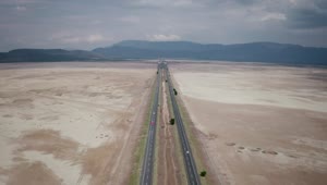Free Stock Video Road With Traffic That Divides A Dry Lagoon Live Wallpaper