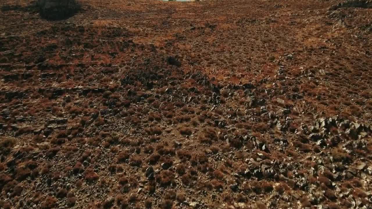 Download Free Stock Video Rocky Fields Next To A Village Live Wallpaper