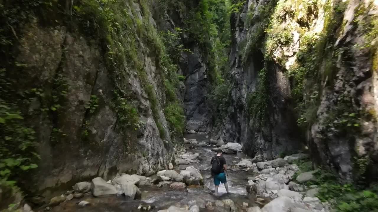 Download Free Stock Video Rocky River In A Forest Between Two Mountains Live Wallpaper