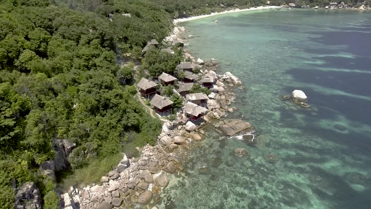 Download Free Stock Video Rocky Seashore With Bungalows Live Wallpaper
