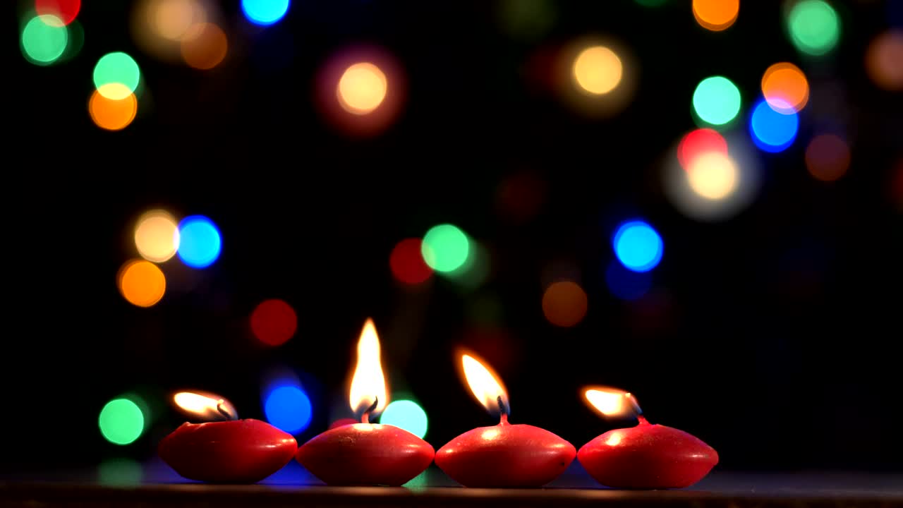 Download Free Stock Video Romantic Candles With A Bokeh Background Live Wallpaper