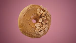 Free Stock Video Rotating Peanut Butter Donut On A Pink Background Live Wallpaper