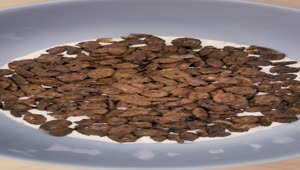 Download Free Stock Video Rotating Shot Of A Bowl Of Chocolate Flavored Cereal Live Wallpaper