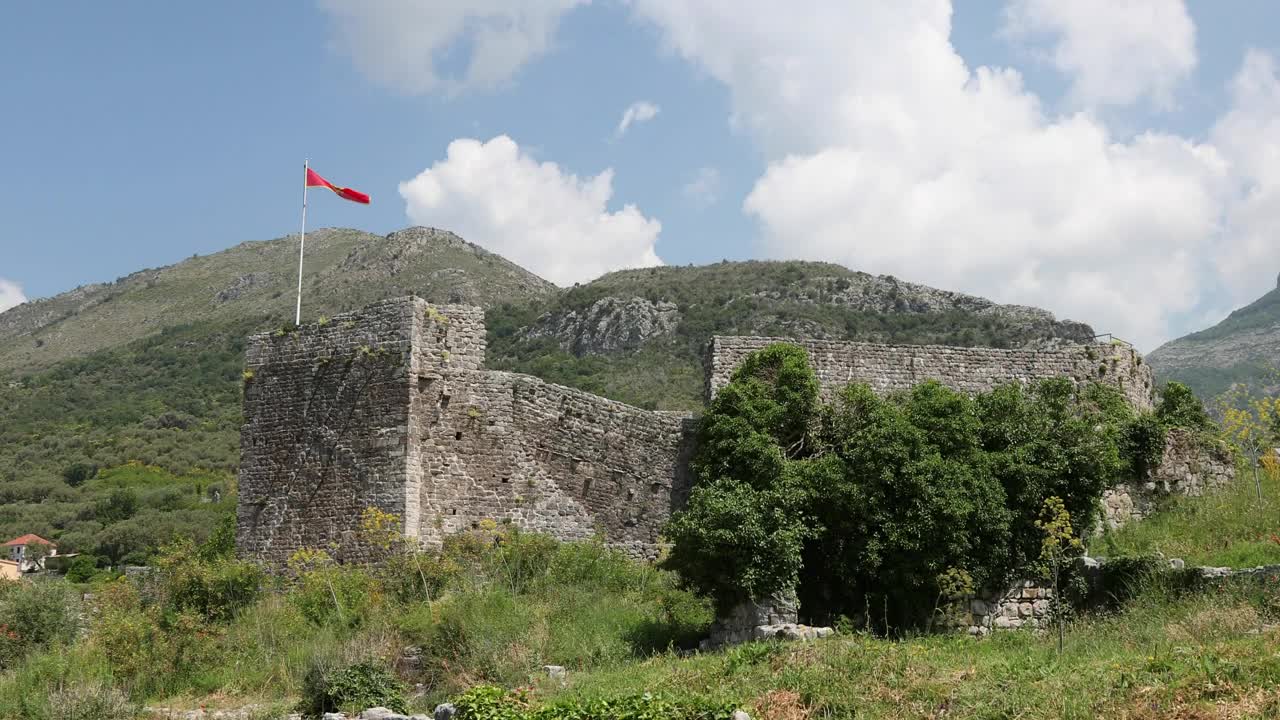 Download Free Stock Video Ruins Of An Old Building With A Red Flag Live Wallpaper