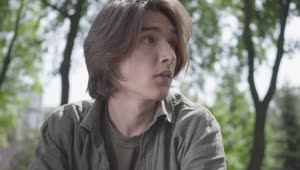 Free Stock Video Sad And Worried Young Man In A Park Live Wallpaper