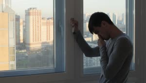 Free Stock Video Sad Man By His Apartment Window Live Wallpaper