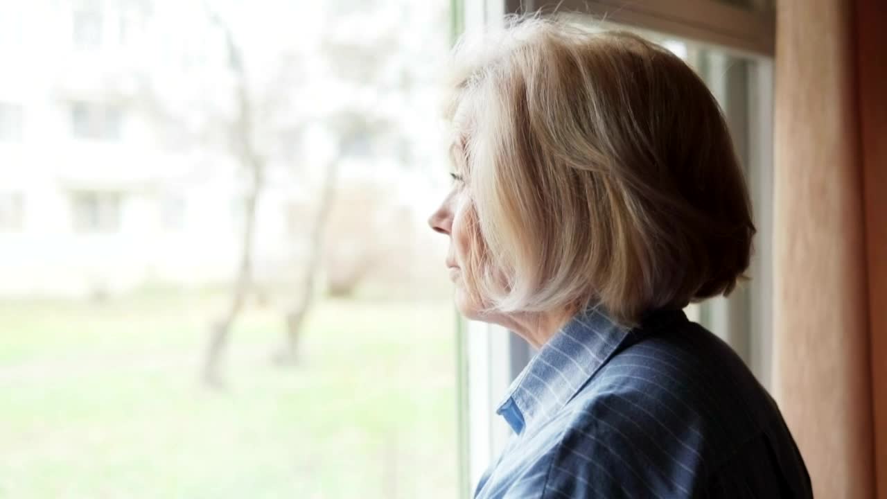 Download Free Stock Video Sad Woman Looking Out Of A Large Window  LargeLive Wallpaper