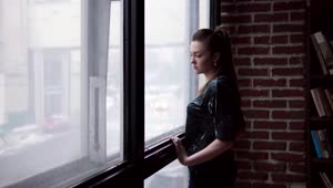 Free Stock Video Sad Woman Looking Out Of The Window Live Wallpaper