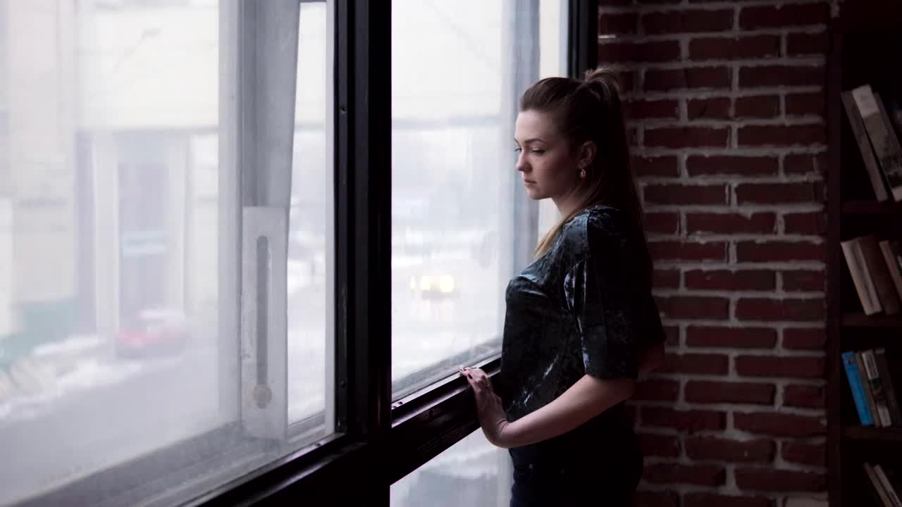 Download Free Stock Video Sad Woman Looking Out Of The Window Live Wallpaper