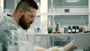 Free Stock Video Scientist Adjusting Equipment In A Laboratory Live Wallpaper