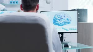 Free Stock Video Scientist Studies D Brain Model In Modern Medical Office Live Wallpaper