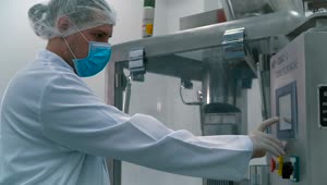 Free Stock Video Scientist Wearing Masks And Gloves In A Laboratory Live Wallpaper