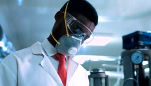 Free Stock Video Scientist With A Facemask In The Lab Live Wallpaper