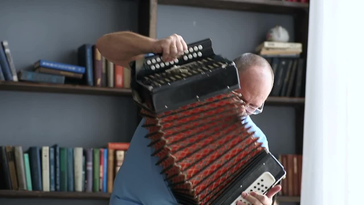 Download Free Stock Video Senior Man Playing The Accordion Live Wallpaper