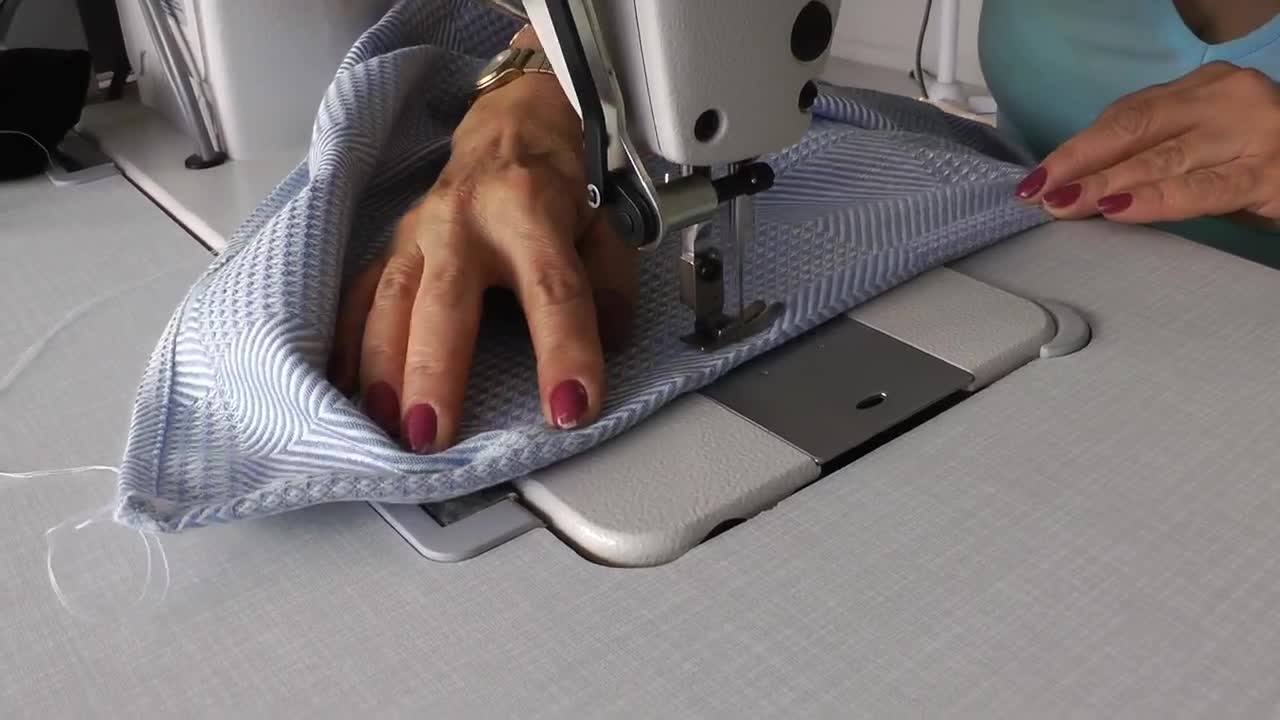 Download Free Stock Video Sewing A Dress On Machine Close Up Live Wallpaper