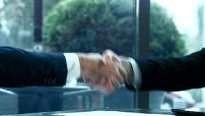 Download Free Stock Video Shaking Hands And Signing Contract Live Wallpaper