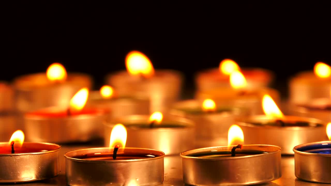 Download Free Stock Video Shot Of Burning Candles In Dark Room Live Wallpaper