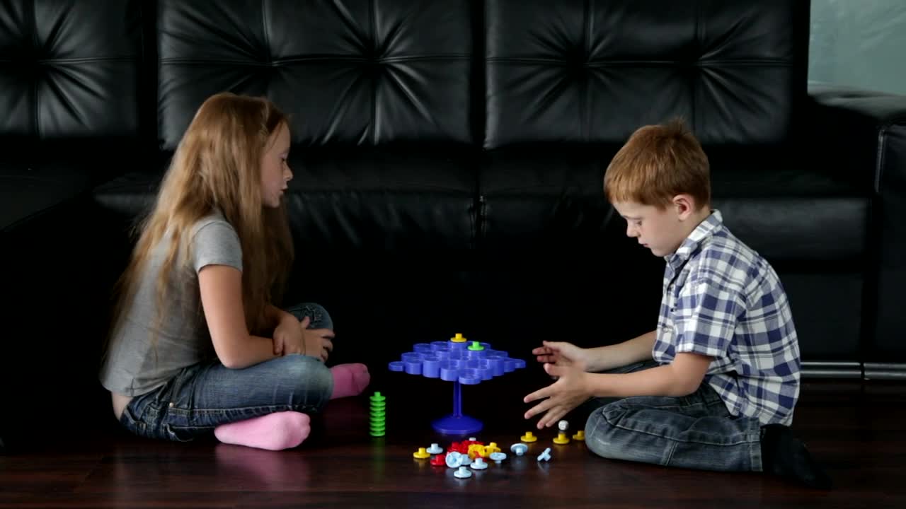 Download Free Stock Video Siblings Playing On The Floor Live Wallpaper