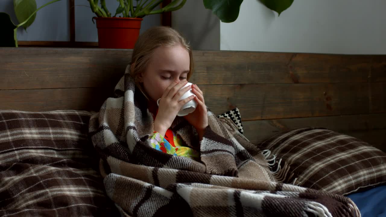Download Free Stock Video Sick Girl Sheltered While Drinking A Tea Live Wallpaper