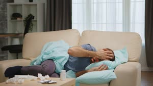 Free Stock Video Sick Man Lays On Sofa During Coronavirus Pandemic Live Wallpaper