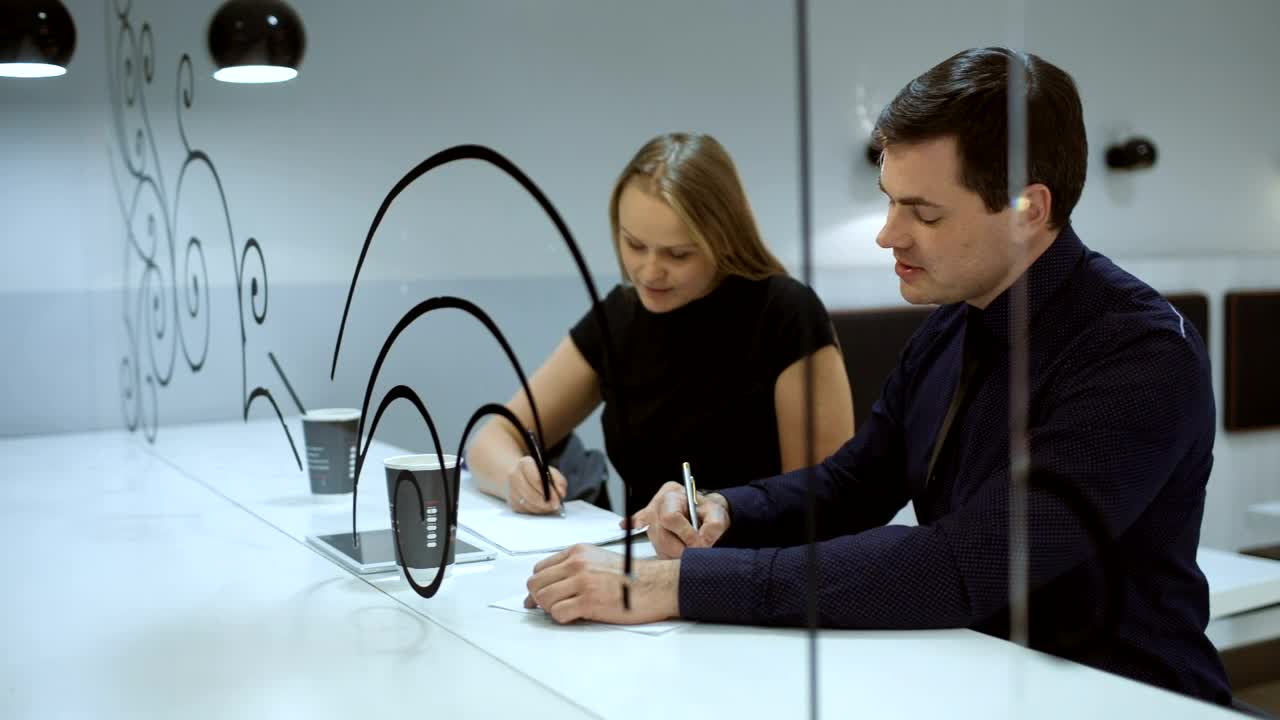 Download Free Stock Video Signing Contracts In A Cafe Live Wallpaper