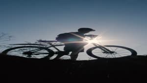 Free Stock Video Silhouette In Front Of The Sun Of A Cyclist Outdoors Live Wallpaper