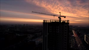 Free Stock Video Silhouette Of A Crane Over A Build Under Construction Live Wallpaper