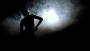 Free Stock Video Silhouette Of A Dancer Against Smoke Live Wallpaper