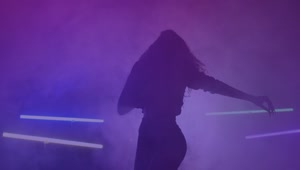 Free Stock Video Silhouette Of A Girl Dancing Energetically In The Dark Live Wallpaper