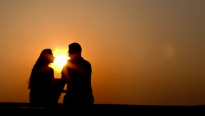 Free Stock Video Silhouette Of Lovers At Sunset Static Shot Live Wallpaper