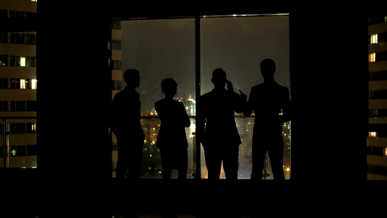 Download Free Stock Video Silhouette Of People Talking By Night View Of City Live Wallpaper