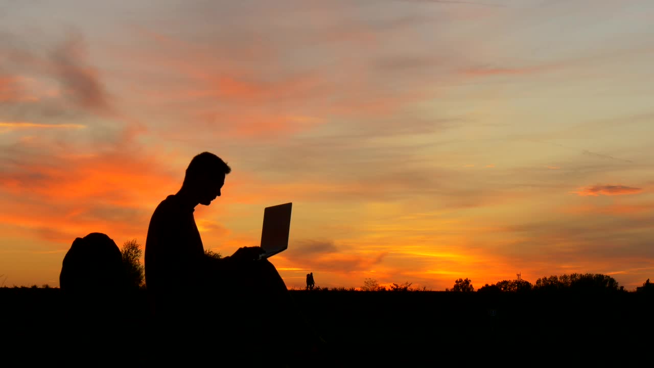 Download Free Stock Video Silhouettes Of People Outdoors At Sunset Live Wallpaper