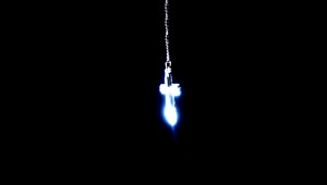 Free Stock Video Silver Crucifix Necklace On Black Background Live Wallpaper
