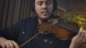 Free Video Stock Skilled Violinist Playing In A Recording Studio Live Wallpaper