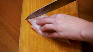 Free Video Stock Slicing Raw Chicken Meat Live Wallpaper