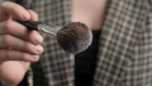 Free Video Stock Slowly Shaking A Powder Makeup Brush Live Wallpaper
