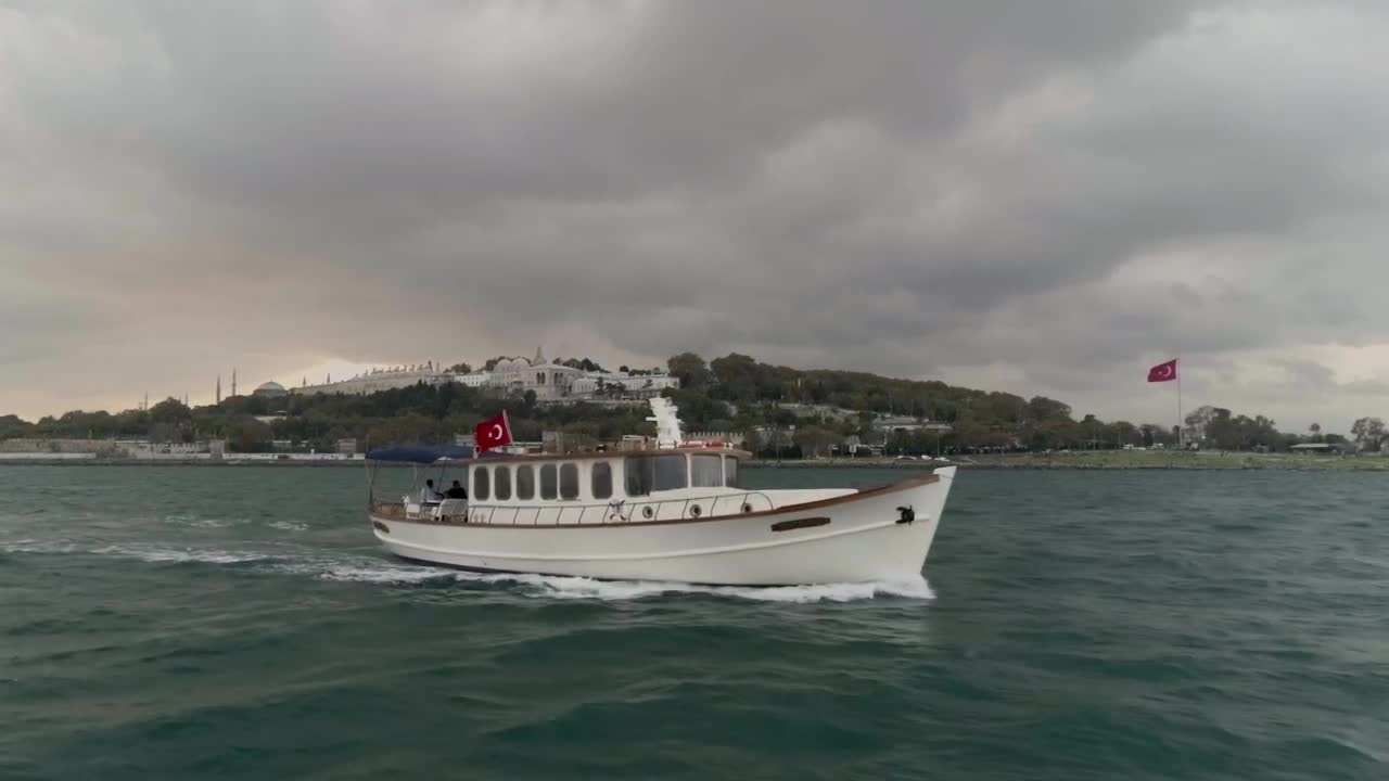 Download Free Video Stock Small Boat Sailing Before A Storm Live Wallpaper