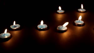 Free Video Stock Small Lit Candles In The Dark Live Wallpaper